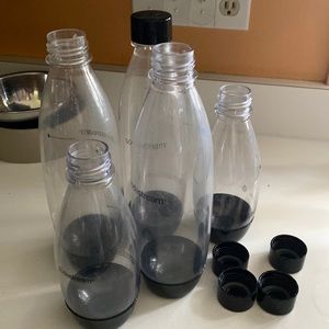 5 sodastream bottles - 3 big ones and 2 little